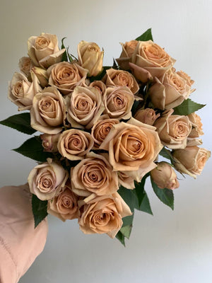 Beige boutonniere and wrist corsage
